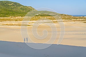 Shadows over the dune in Ponta dos Ingleses in Costao do Santinho beach