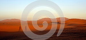 Shadows at sunset in the desert Sahara