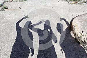 Shadows of three friends