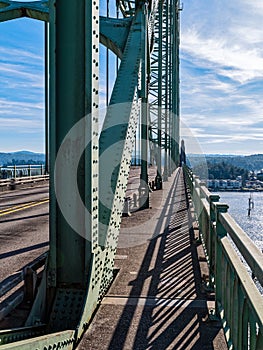 Shadows on the walkway of the Yaquina Bay Bridge in Newport, Oregon, USA