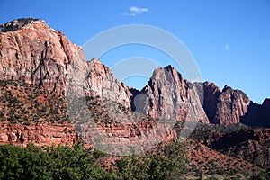 The shads of red painted on the ancient rock walls of Zion National Park