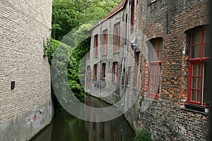 A shady water canal in Brugges