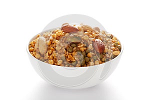 \'Shahi Mixture\' in a white ceramic bowl made almond cashew corn flakes almonds