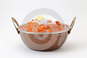Shahi paneer or kadai paneer in a copper brass bowl