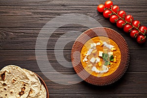 Shahi paneer traditional Indian vegetarian gravy meal with vegetables and butter paneer cheese photo