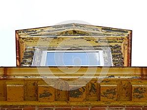 Shaker Trustee Building rooftop dormer window detail photo