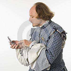 Shakespeare using cell phone.