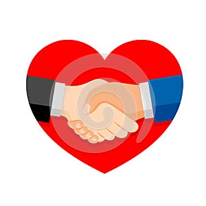 Shaking hands on business in red heart shape. photo