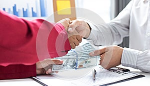 Shaking hands with congratulations on an evil plan