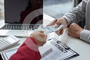 Shaking hands with congratulations on an evil plan