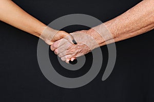 Shaking hands of man with woman stock photo
