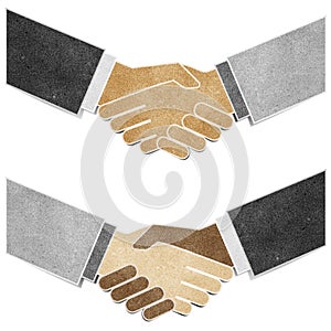 Shaking hands recycled paper craft