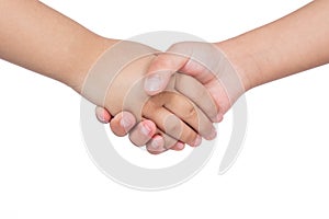 Shaking hands of two children