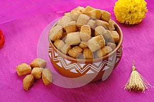 Shakkar pare Shakkarpare shankar pale is a sweet tea time snack food from India, Traditional homemade indian maharashtrian