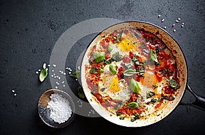 Shakshouka Eggs poached eggs in a spicy tomato sauce