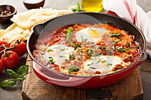 Shakshuka with chickpeas in a skillet