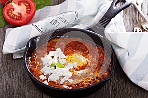 Shakshuka with tomatoes and eggs