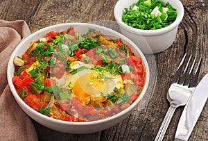 Shakshuka with tomatoes and eggs