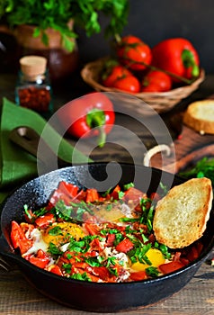 Shakshuka is a traditional breakfast of Israeli cuisine. Eggs fr