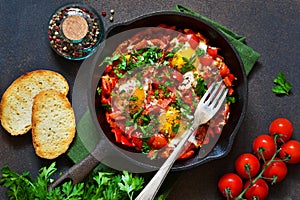 Shakshuka is a traditional breakfast of Israeli cuisine. Eggs fr