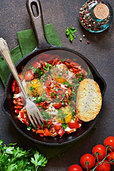 Shakshuka is a traditional breakfast of Israeli cuisine. Eggs fr