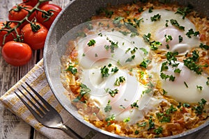 Shakshuka - traditional dish of israeli cuisine in a skillet