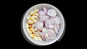 Shallot and garlic on white bowl isolated background