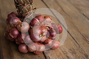 Shallots group on wood