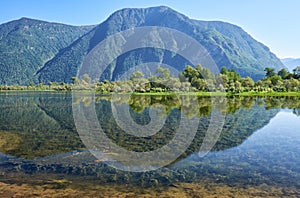 Shallow bay on South part of Lake Teletskoye in Altay photo