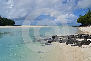 The shallow beach water area between Ile aux Cerfs and Ilot Mangenie