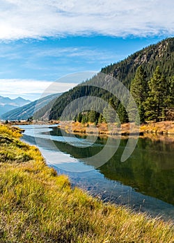 Shallow creek running along a mountain slope