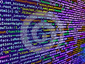 Shallow Depth of Field effect. Programmer working in computer screen. Developer working on program codes in office. Data
