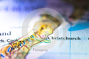 Shallow depth of field focus on geographical map location of Christchurch city in New Zealand Oceania Australasia continent on atl