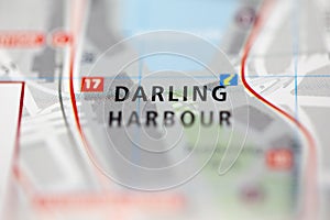 Shallow depth of field focus on geographical map location of Darling Harbour Sydney Australia Asia continent on atlas