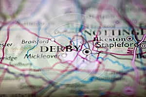 Shallow depth of field focus on geographical map location of Derby city England United Kingdom Great Britain Europe continent on a photo