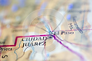 Shallow depth of field focus on geographical map location of El Paso and Ciudad Juarez city United States of America USA continent photo