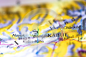 Shallow depth of field focus on geographical map location of Kabul city in Afghanistan Asia continent on atlas