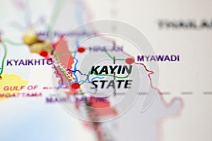 Shallow depth of field focus on geographical map location of Kayin State Myanmar Asia continent on atlas