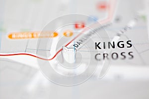 Shallow depth of field focus on geographical map location of Kings Cross Sydney Australia Asia continent on atlas