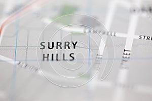 Shallow depth of field focus on geographical map location of Surry Hills Sydney Australia Asia continent on atlas
