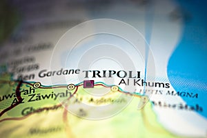Shallow depth of field focus on geographical map location of Tripoli city in Libya Africa continent on atlas