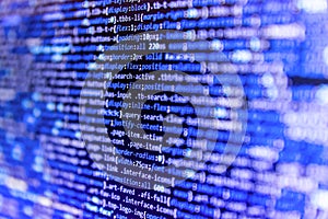 Shallow depth of field, selective focus effect. Programming source code abstract screen of software developer. Template of website