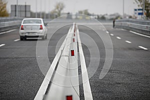 Shallow depth of field selective focus image with concrete Jersey barriers Jersey walls or Jersey bumps on a highway