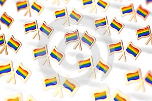 Shallow DOF focus on Rainbow LGBTQ flags group. Gay pride month symbol concept.  on white background. 3D rendering