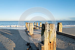 Shallow  focus of a nearby wooden beach groyne.