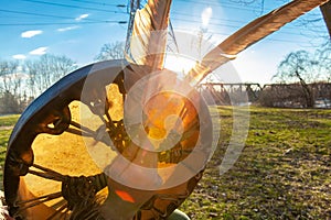 Shaman holds sacred objects outdoors