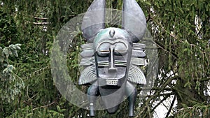 Shaman mask in the forest