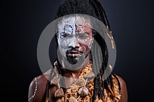 Shaman tribal ritual man isolated in studio