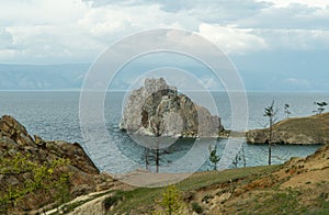 Shamanka Rock on Olkhon. one of the nine Holy places of Asia. Cape Burhan. landscape of Siberian Baikal Lake