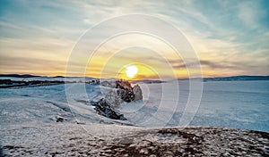 Shamanka rock at sunset,Lake Baikal, Siberia, Russia.